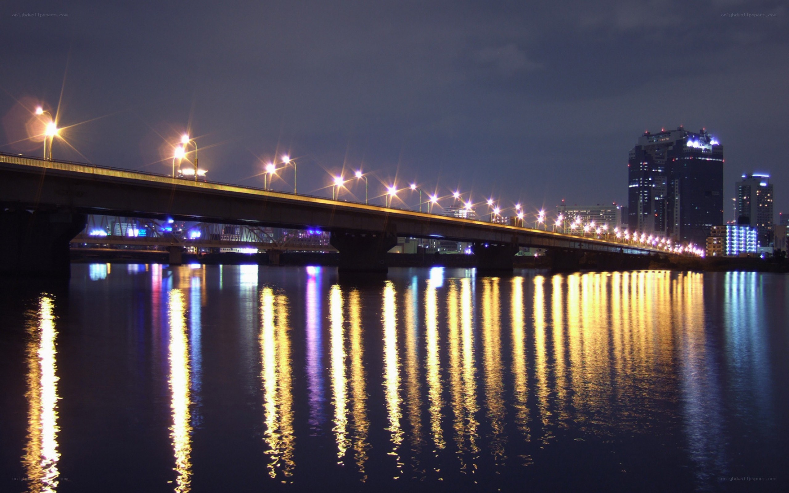 nighttime city bridge view