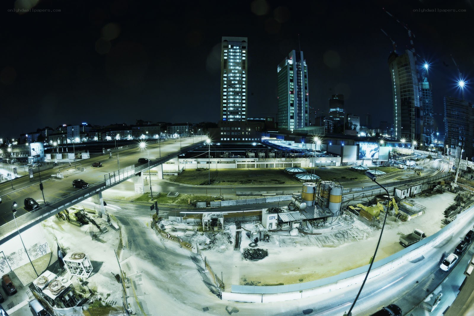 Nighttime city construction site