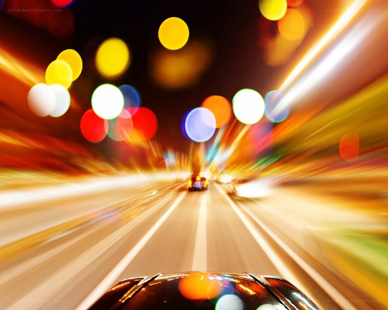 nighttime city driving with light trails
