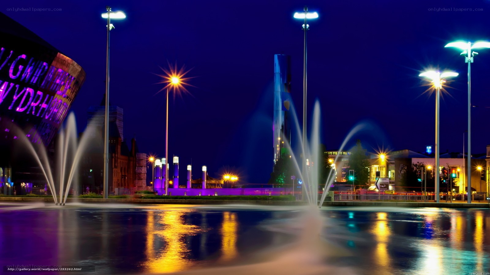 Nighttime city fountain scene