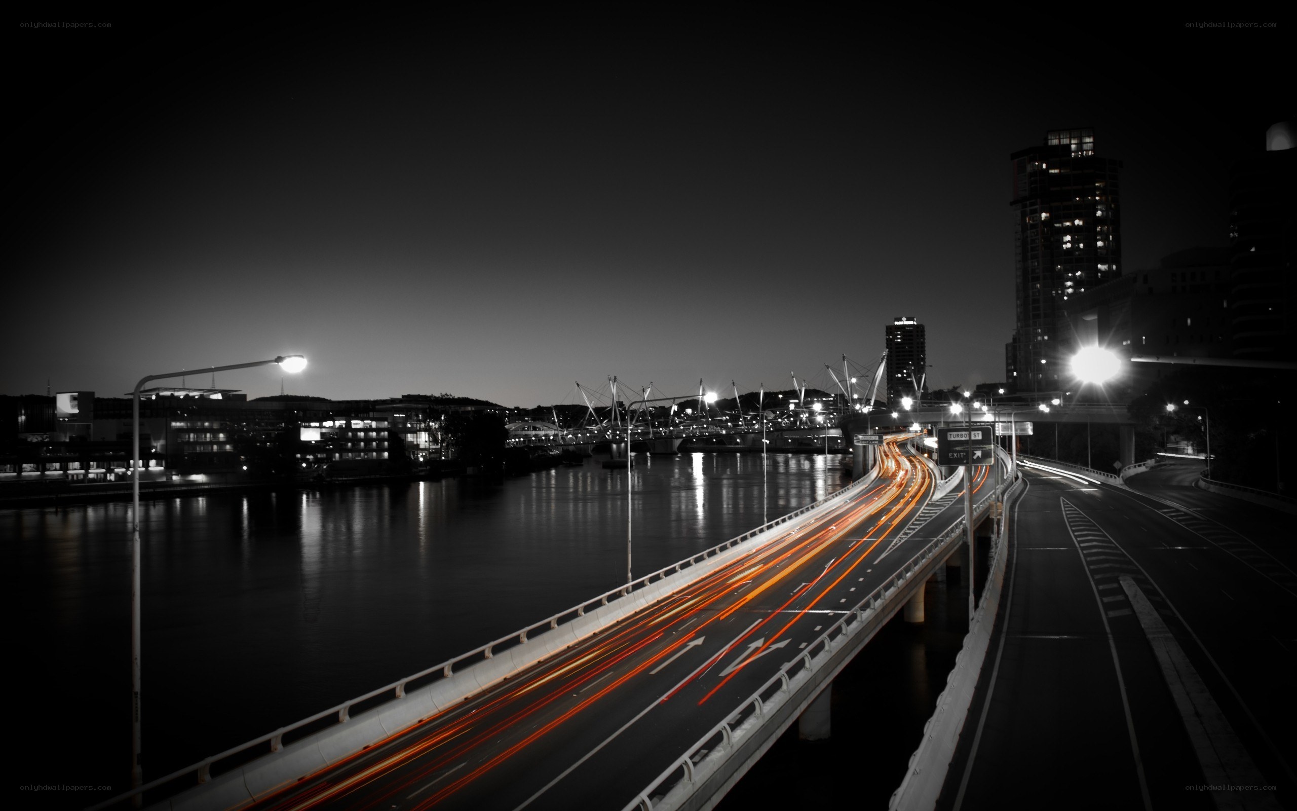 Nighttime city highway bridge