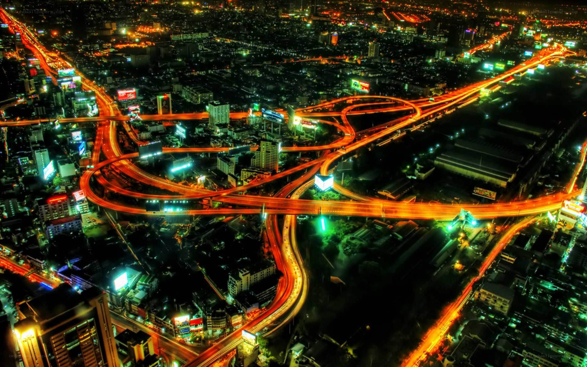 nighttime city highway interchange