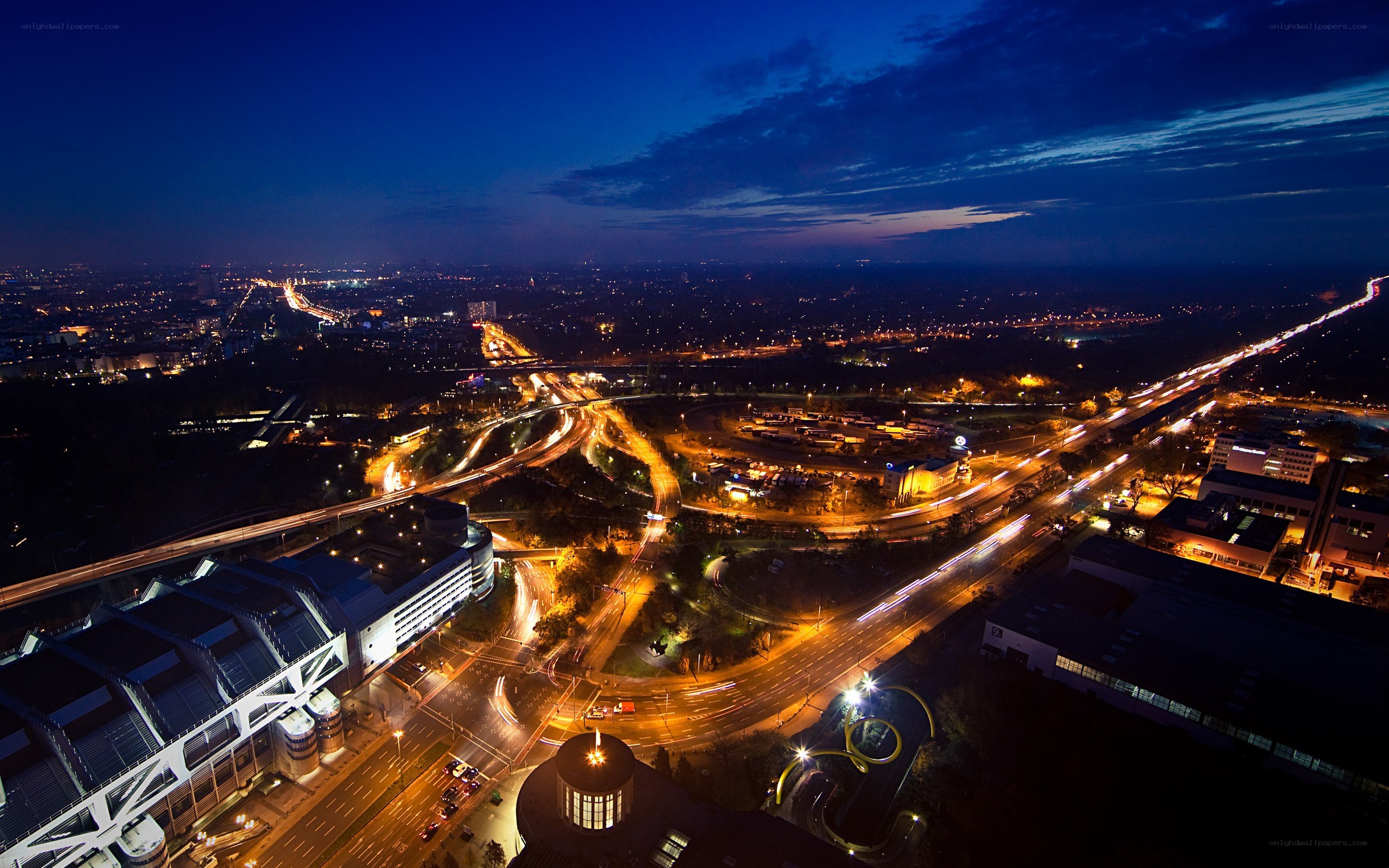 nighttime city highway interchange