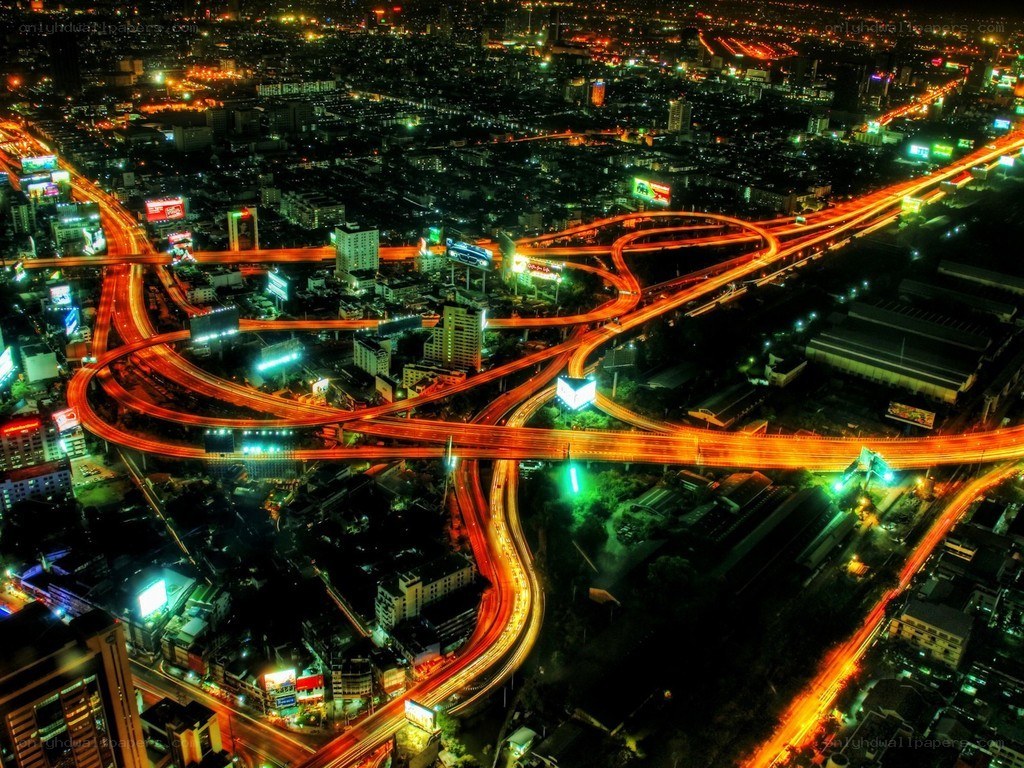 nighttime city highway interchange