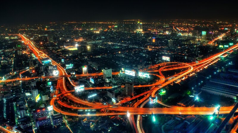 nighttime city highway interchange