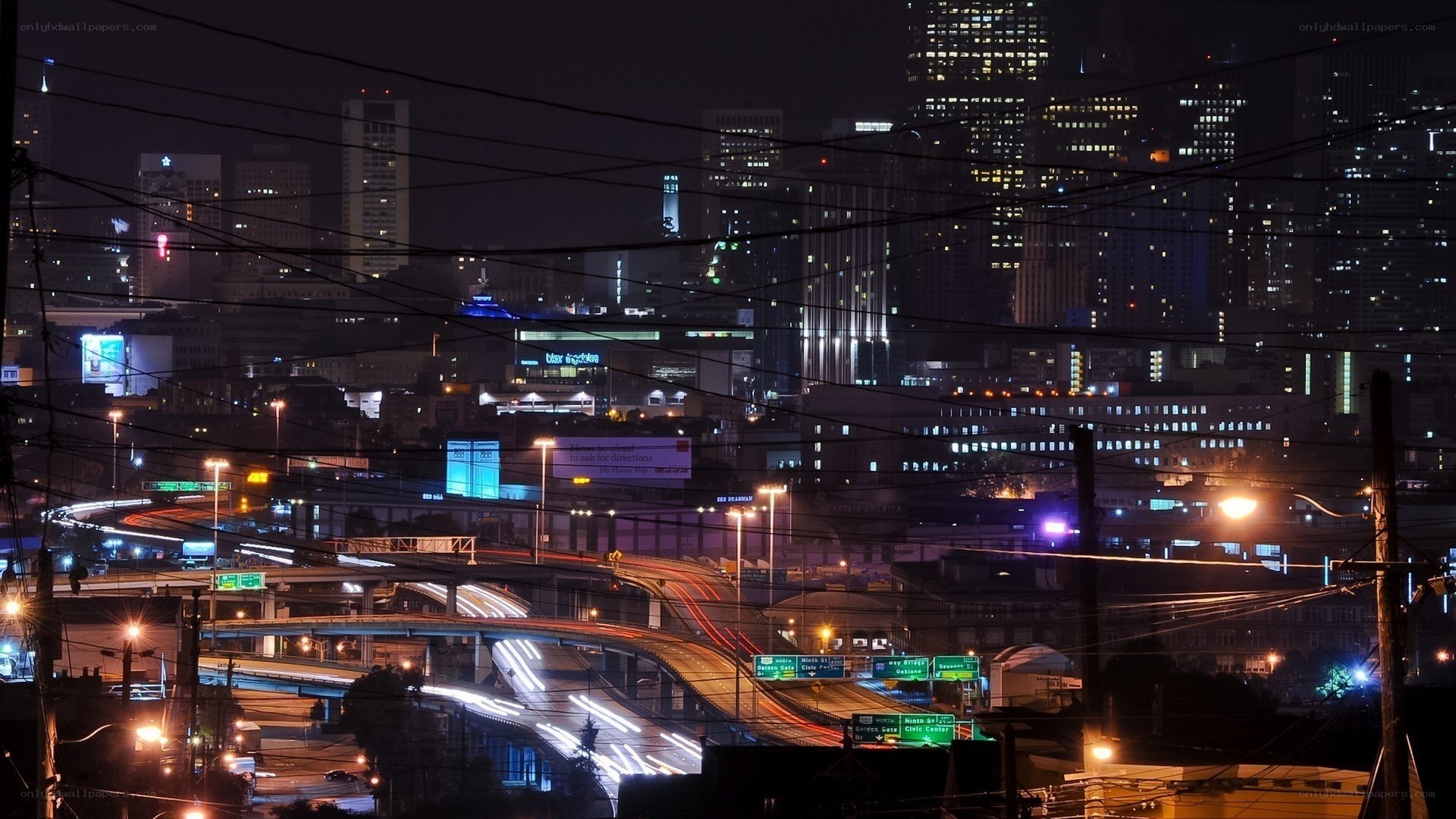 nighttime city highway interchange