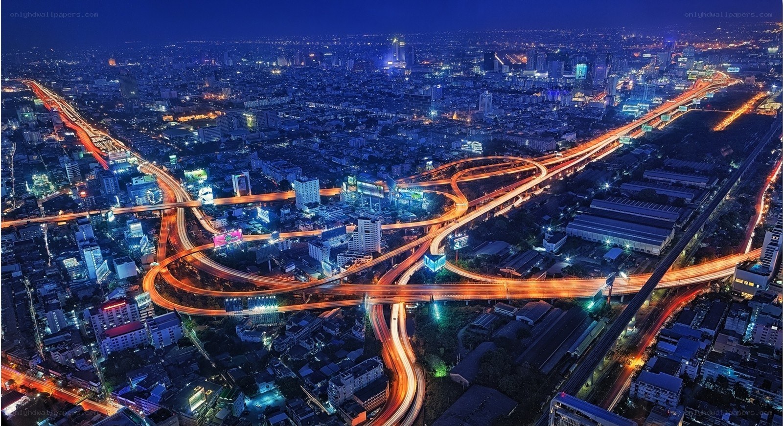 nighttime city highway interchange