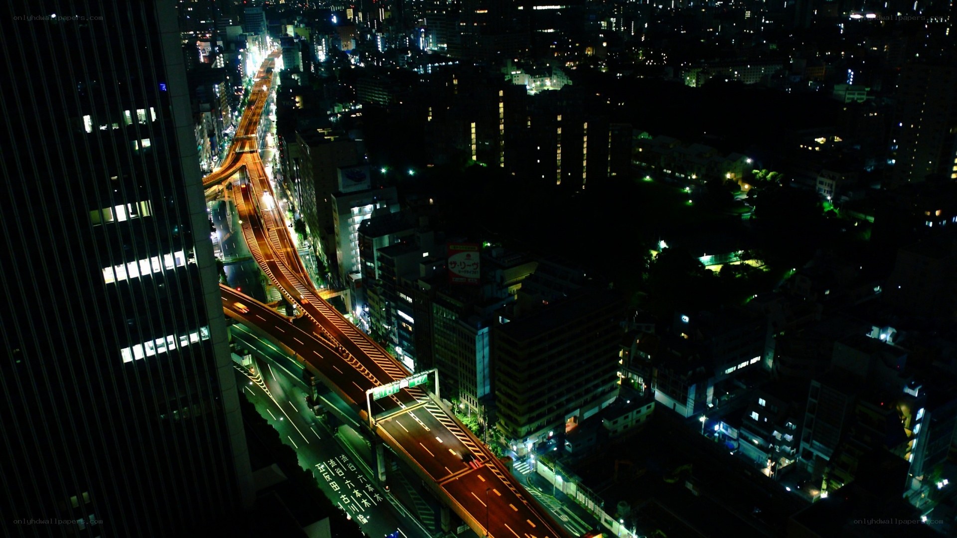 nighttime city highway intersection