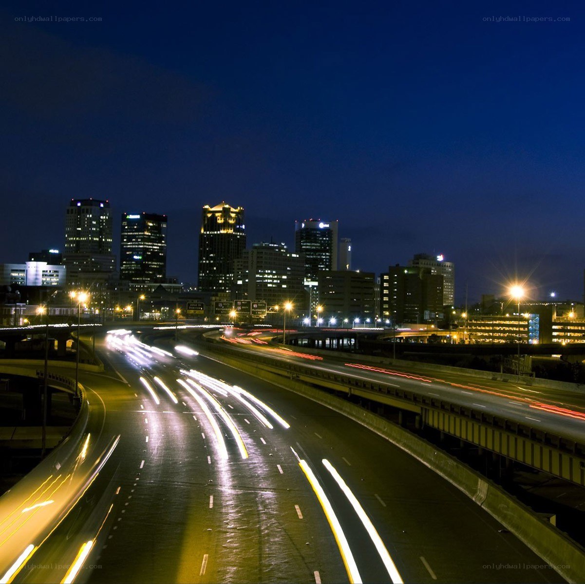 nighttime city highway traffic