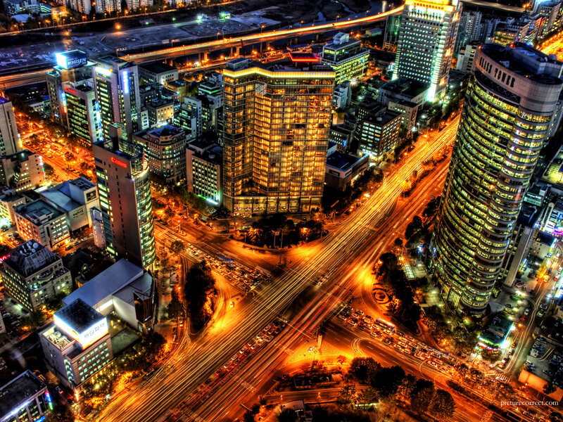 Nighttime City Intersection — Orange, Dramatic