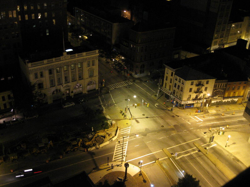 nighttime city intersection view
