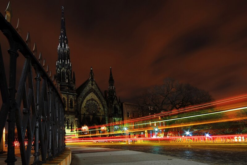Nighttime city lights and church