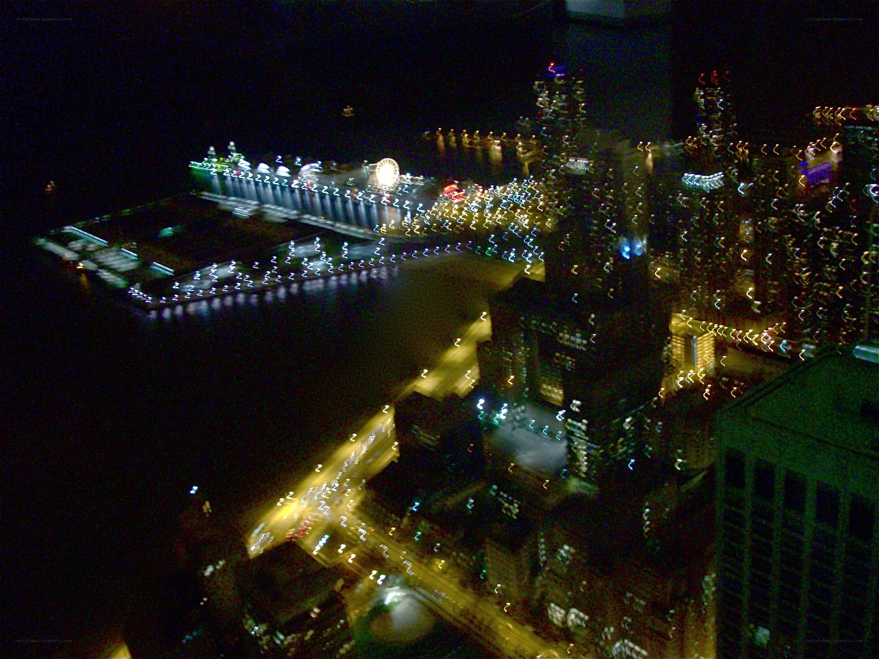 nighttime city lights from above