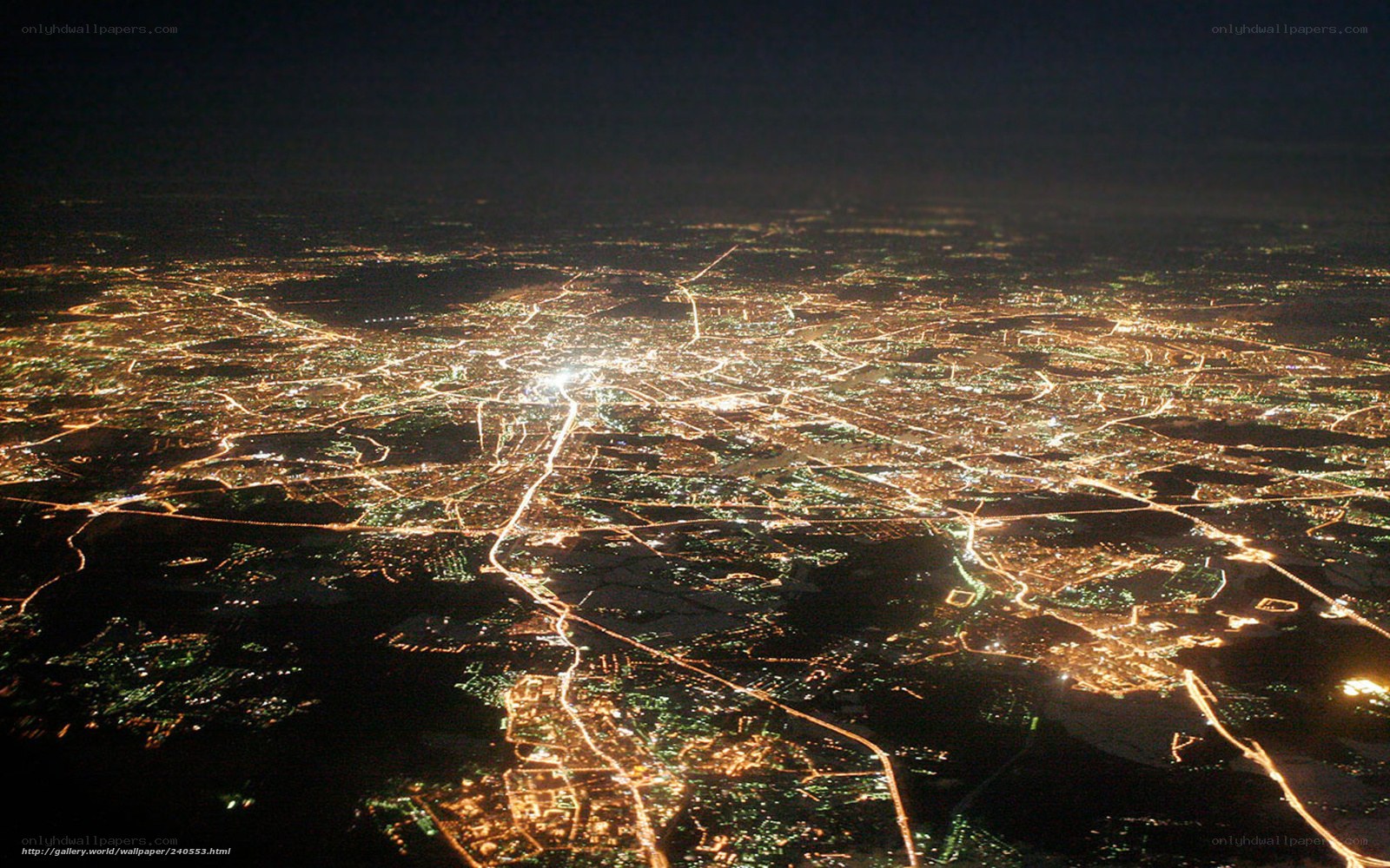 nighttime city lights from above