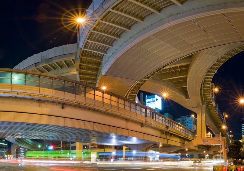 Nighttime city overpass scene