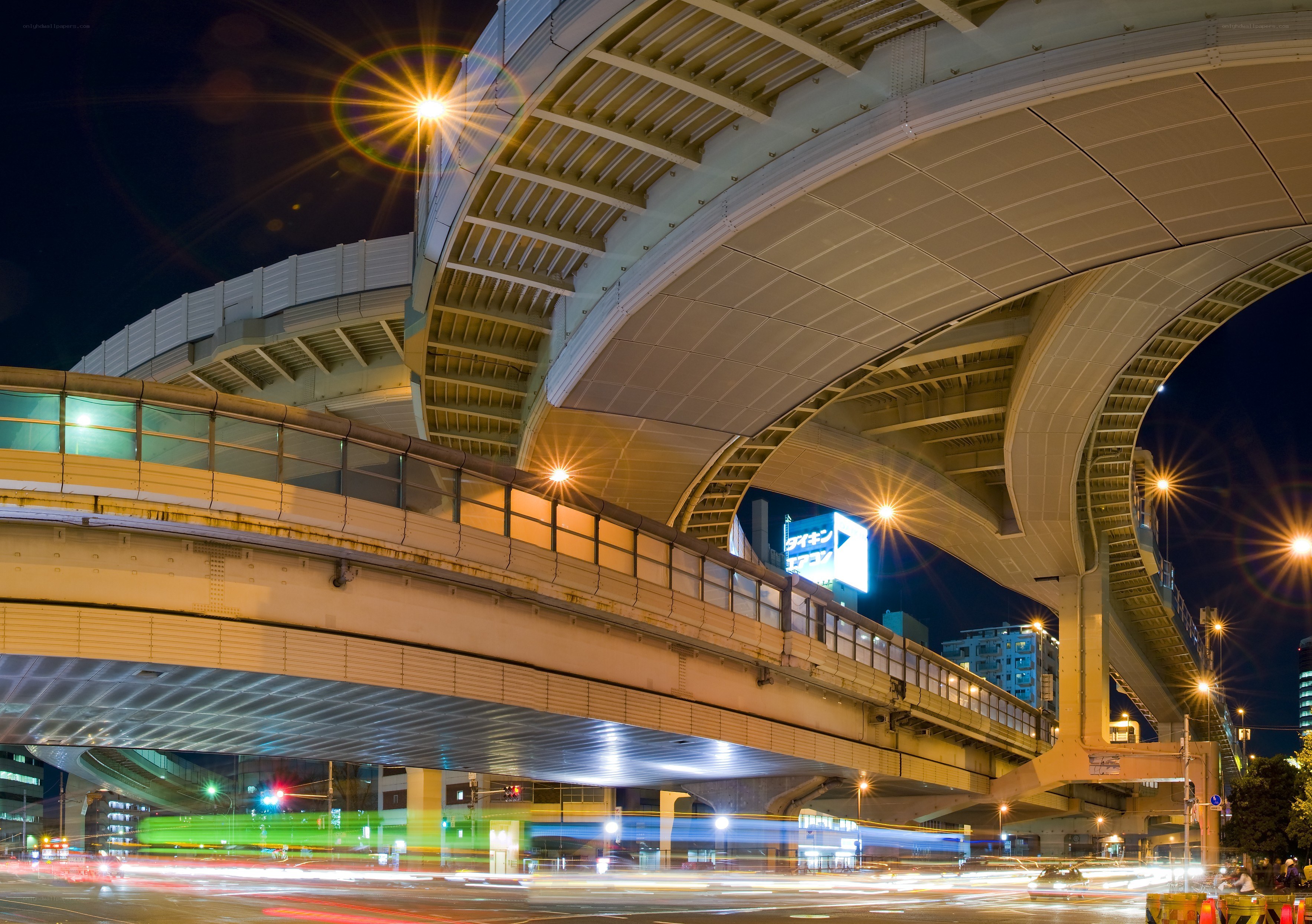 Nighttime city overpass scene