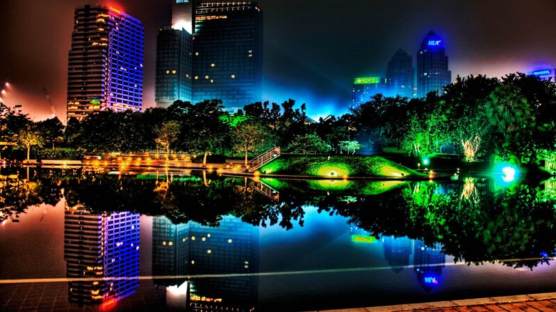 nighttime city park with reflections