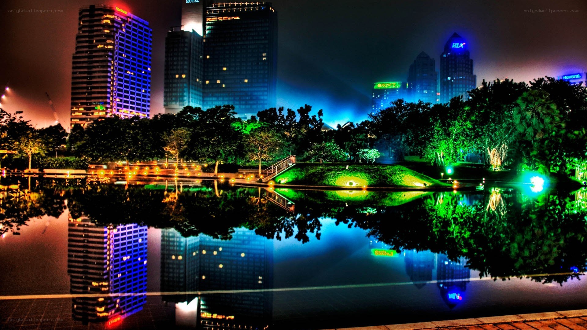 nighttime city park with reflections