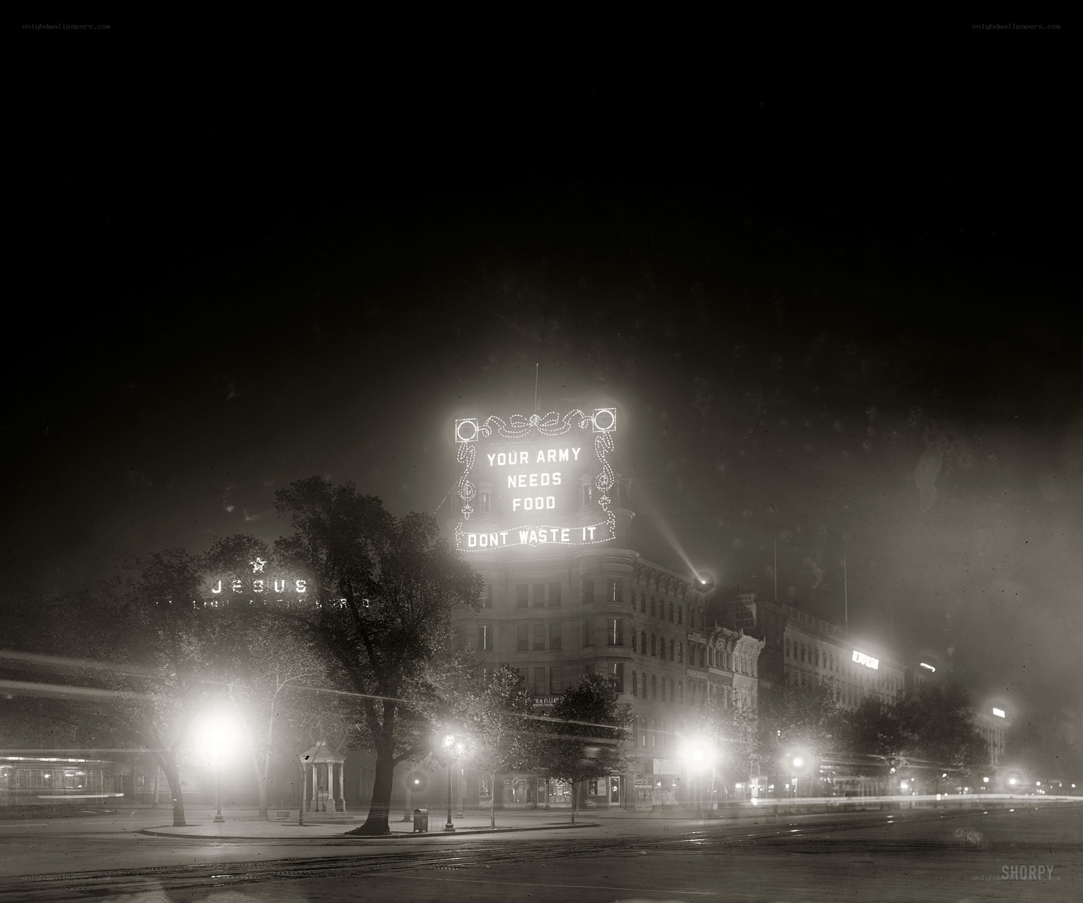 Nighttime city scene with billboard