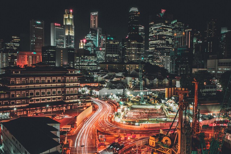 Nighttime City Skyline — Black, Dramatic, Night, Photograph, Skyscrapers, Construction Site, Light Trails