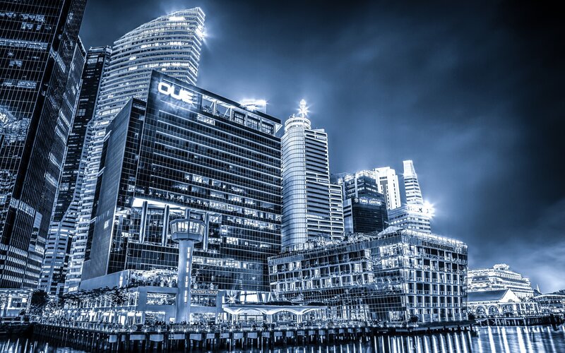 nighttime city skyline by the water