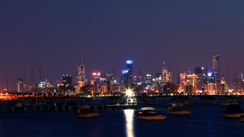 nighttime city skyline by the water