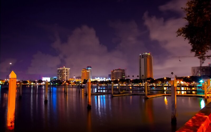 nighttime city skyline by the water