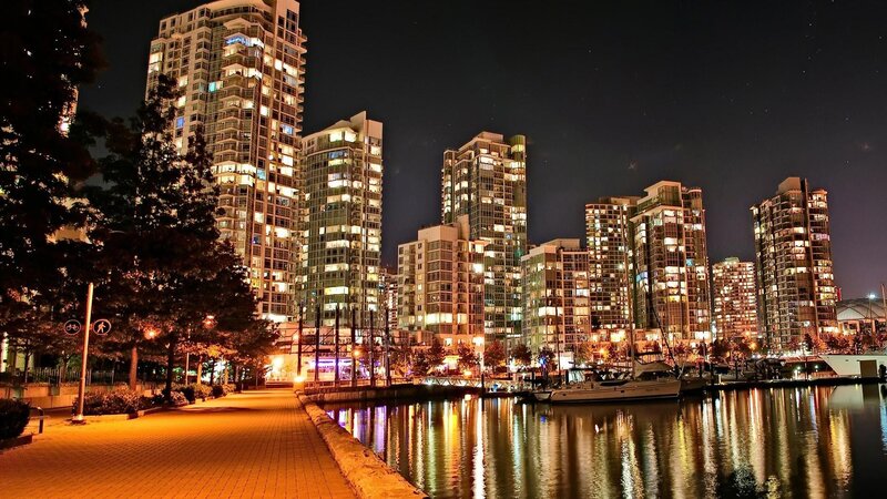 nighttime city skyline by the water
