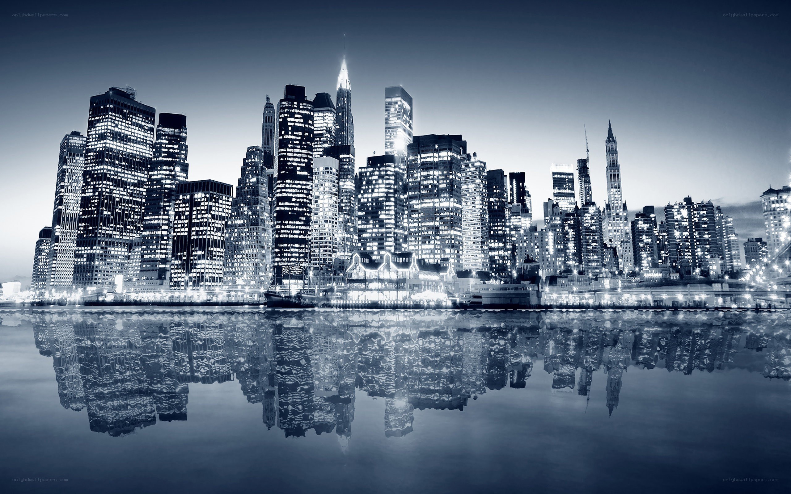 nighttime city skyline reflection