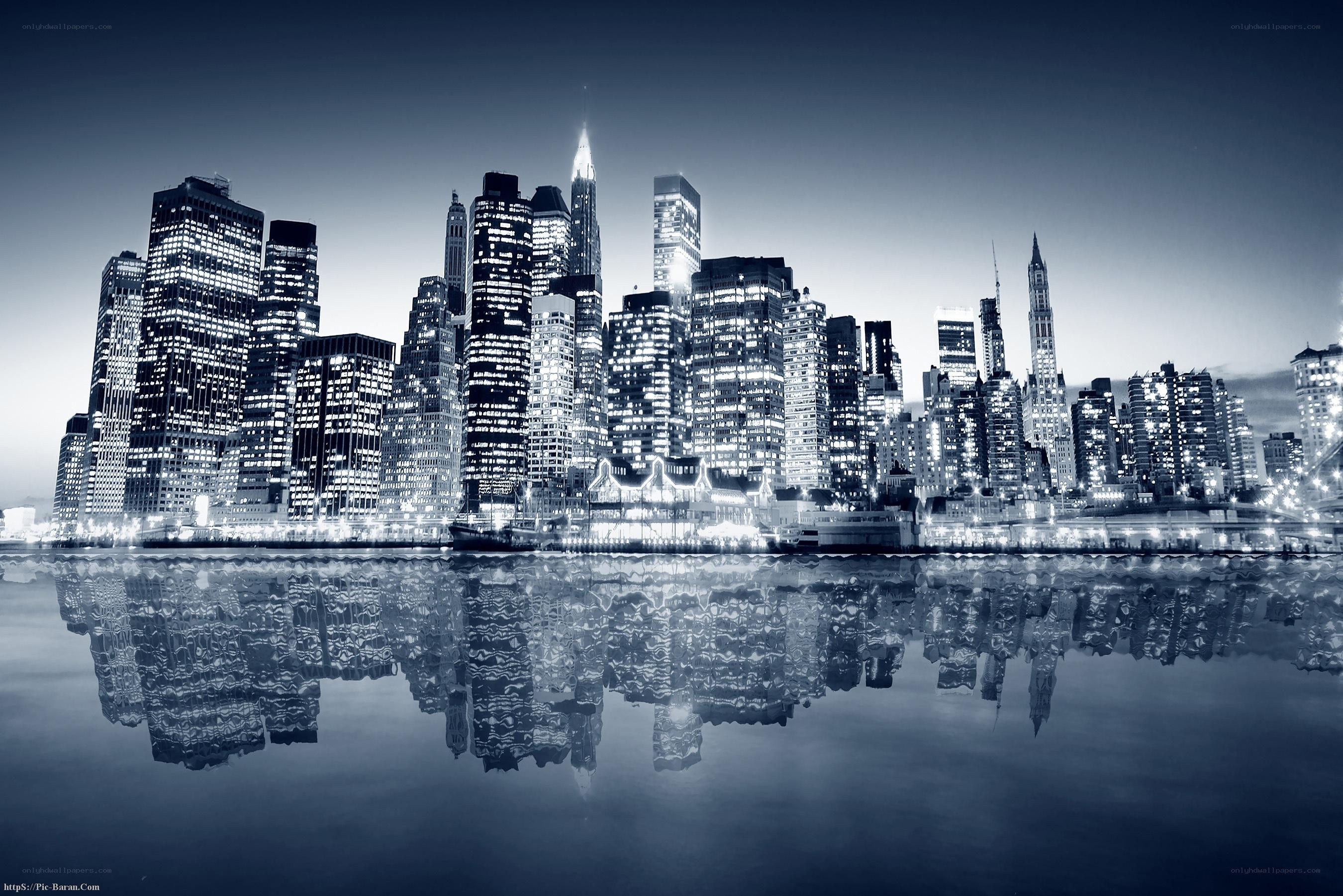 nighttime city skyline reflection