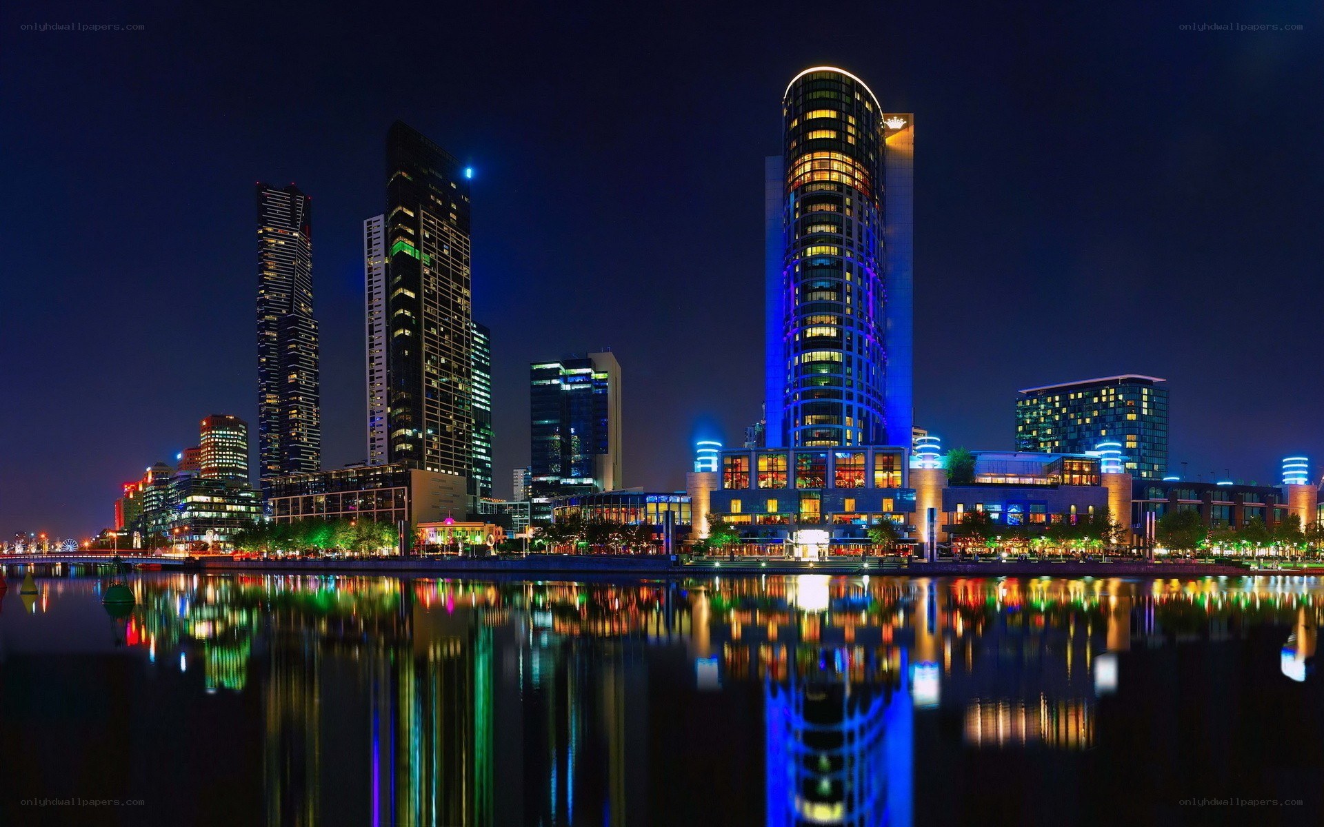 nighttime city skyline reflection