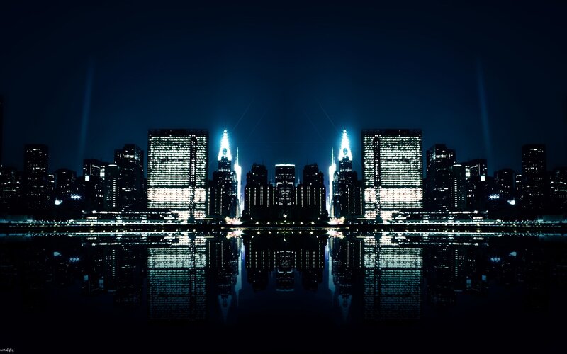 nighttime city skyline reflection
