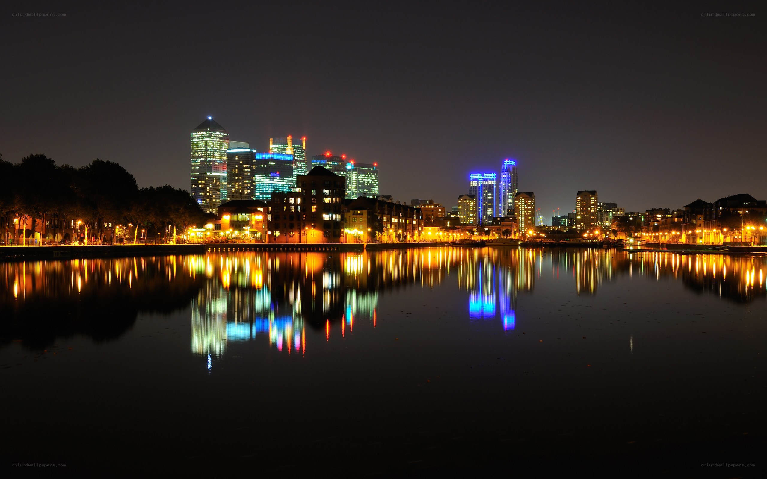 nighttime city skyline reflection