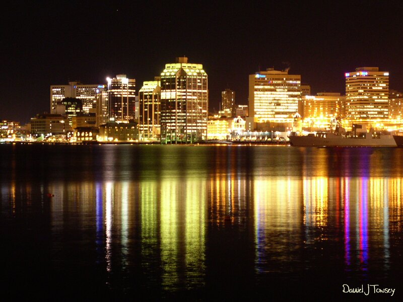 nighttime city skyline reflection