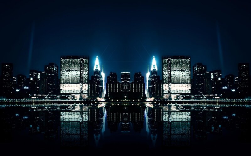 nighttime city skyline reflection