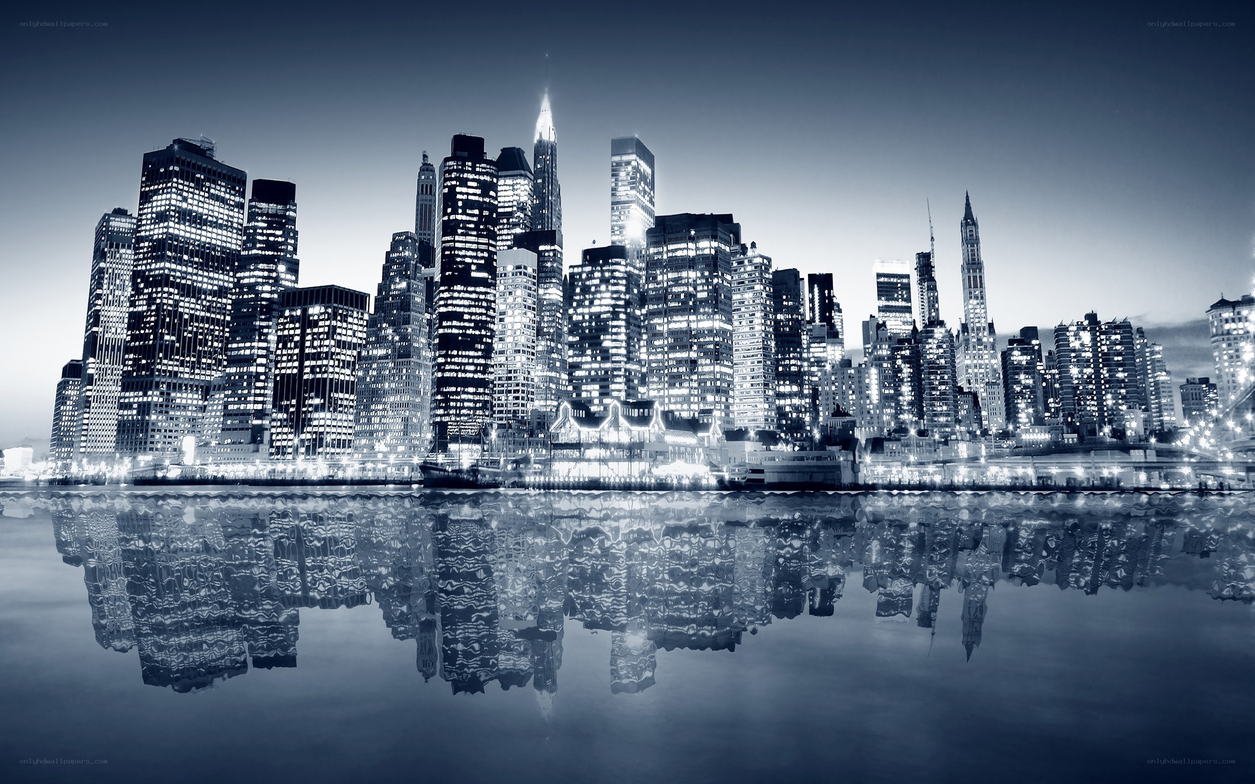 nighttime city skyline reflection