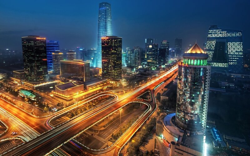 Nighttime City Skyline — Traffic