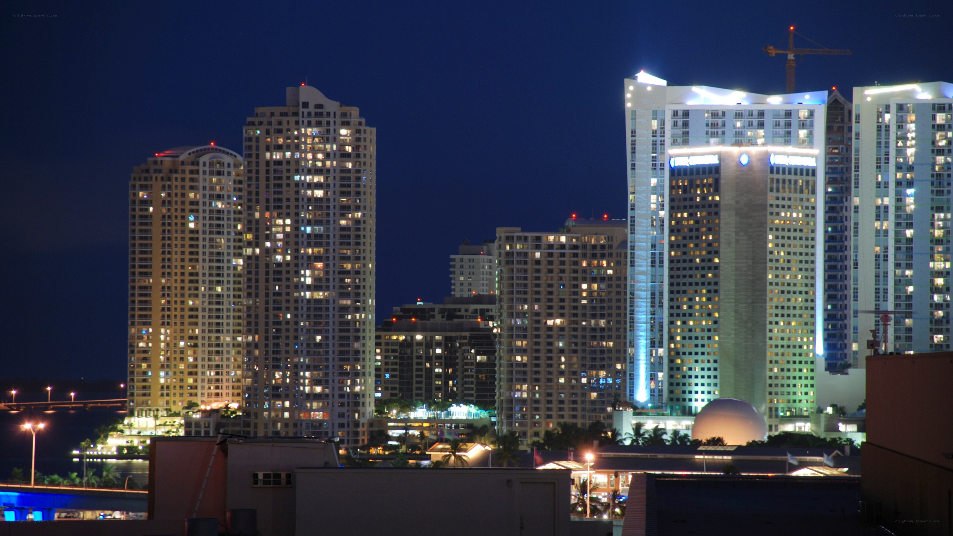 nighttime city skyline with high-rises