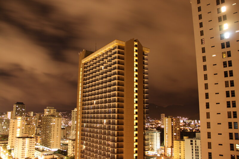 nighttime city skyline with high-rises