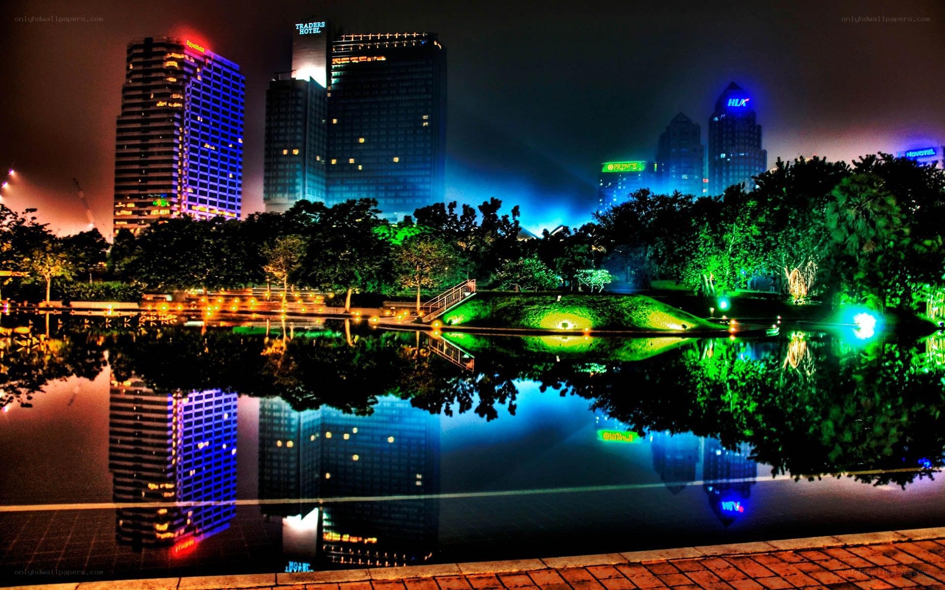 nighttime city skyline with reflections