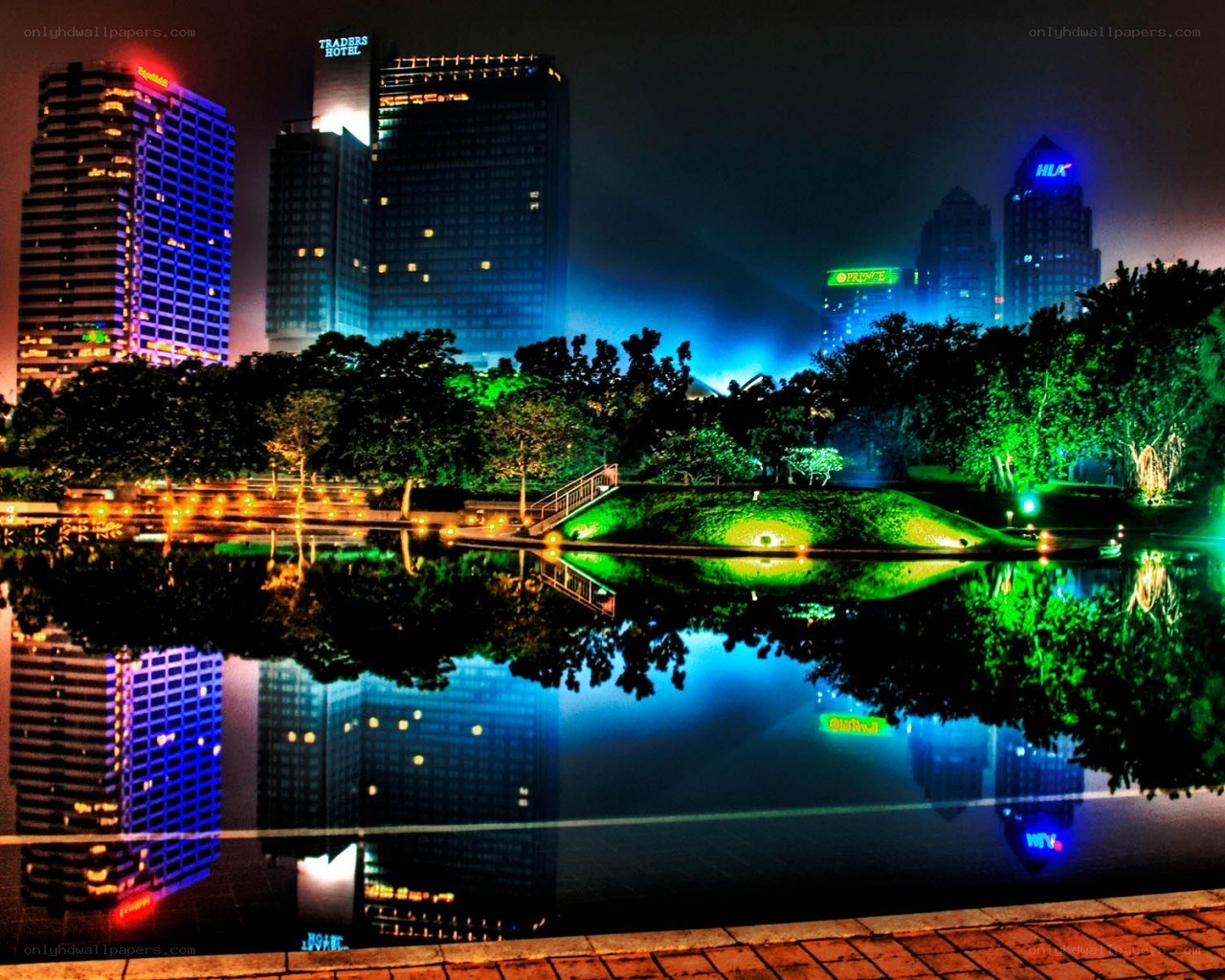 nighttime city skyline with reflections