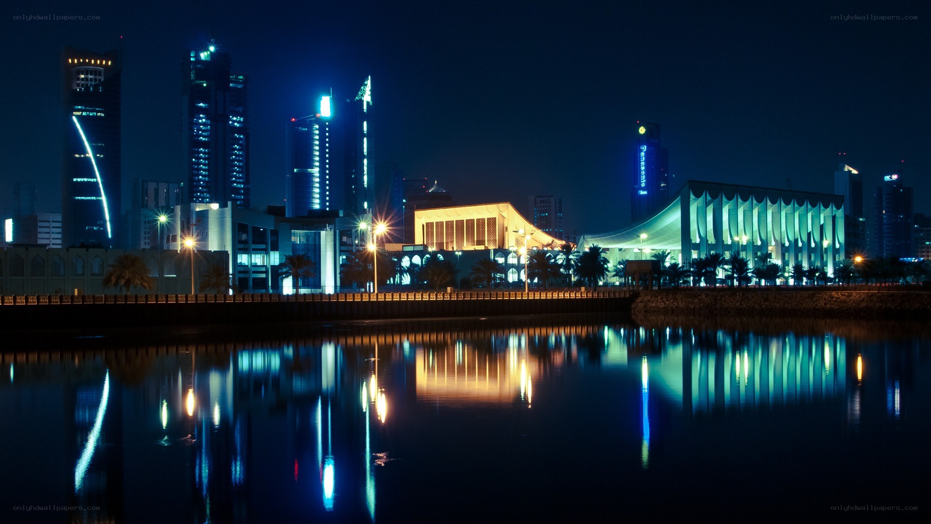 nighttime city skyline with reflections