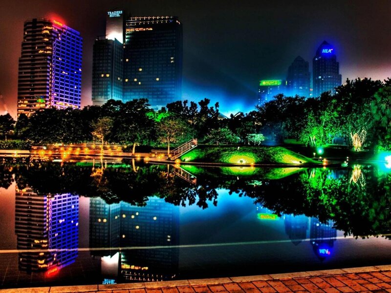 nighttime city skyline with reflections