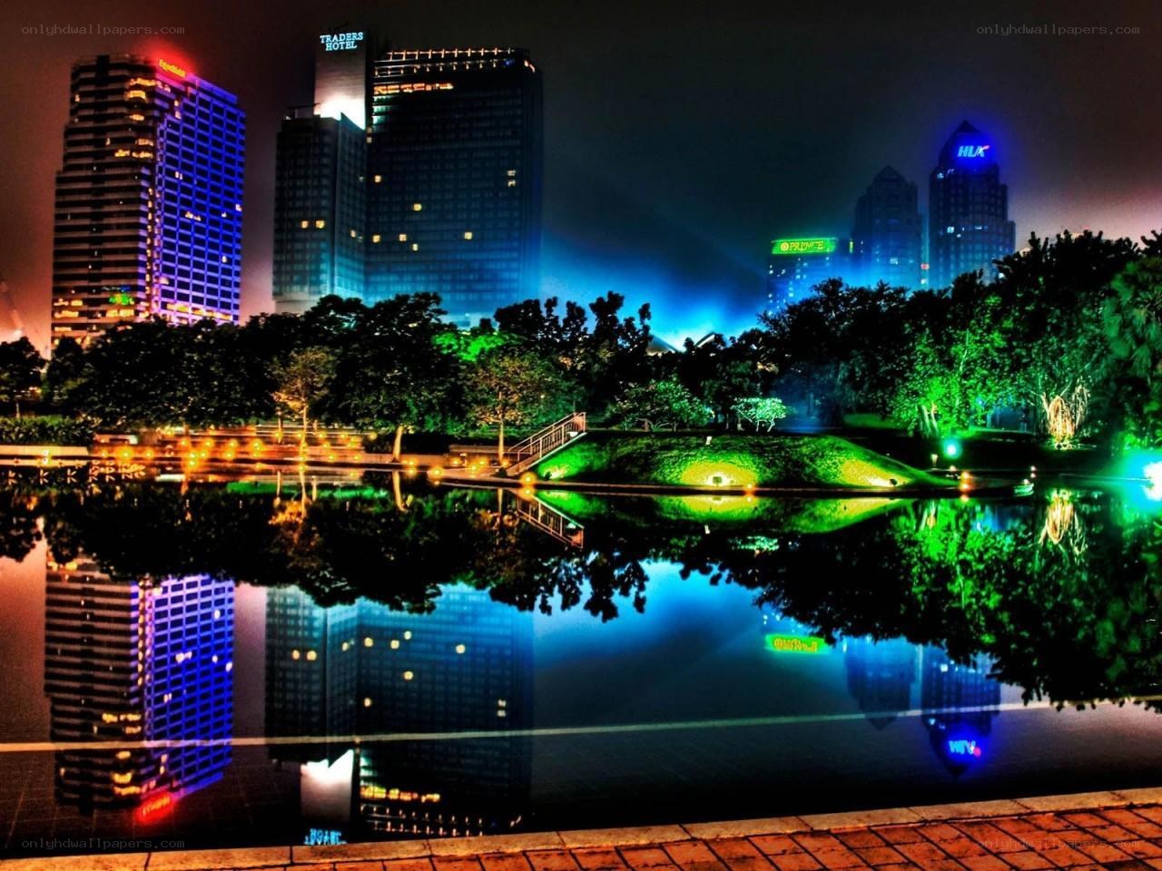 nighttime city skyline with reflections