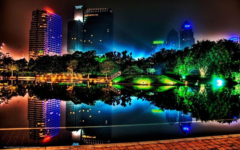 nighttime city skyline with reflections