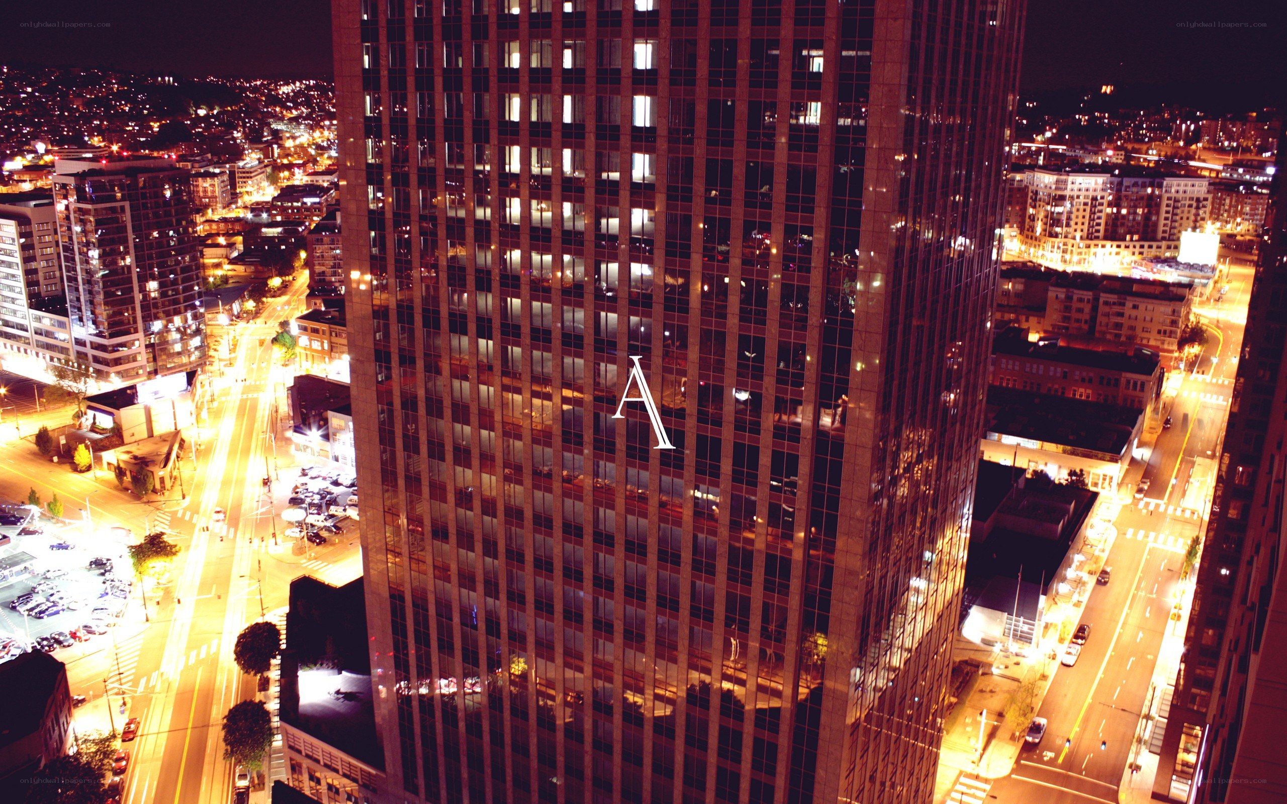 nighttime city skyline with skyscraper