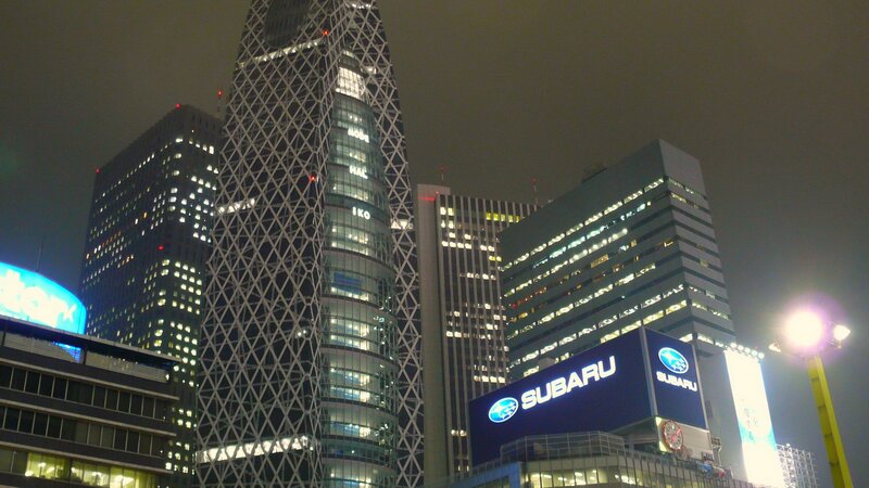 nighttime city skyline with skyscrapers