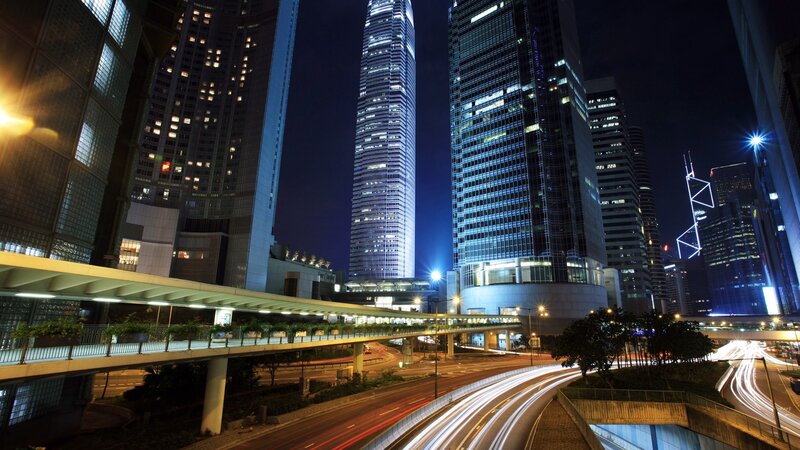 nighttime city skyline with skyscrapers