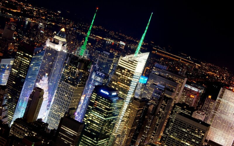 nighttime city skyline with skyscrapers
