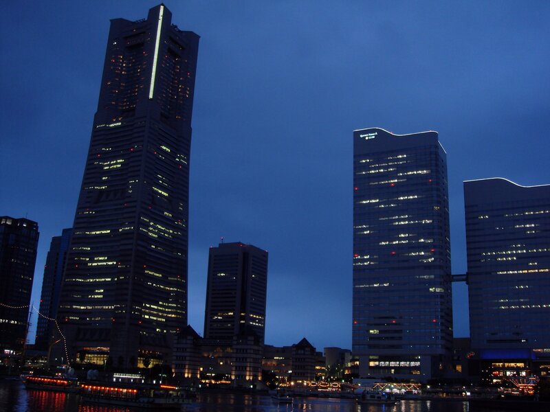 nighttime city skyline with skyscrapers